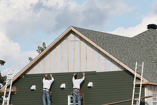 Professional Siding Replacement technician working in Olney, TX